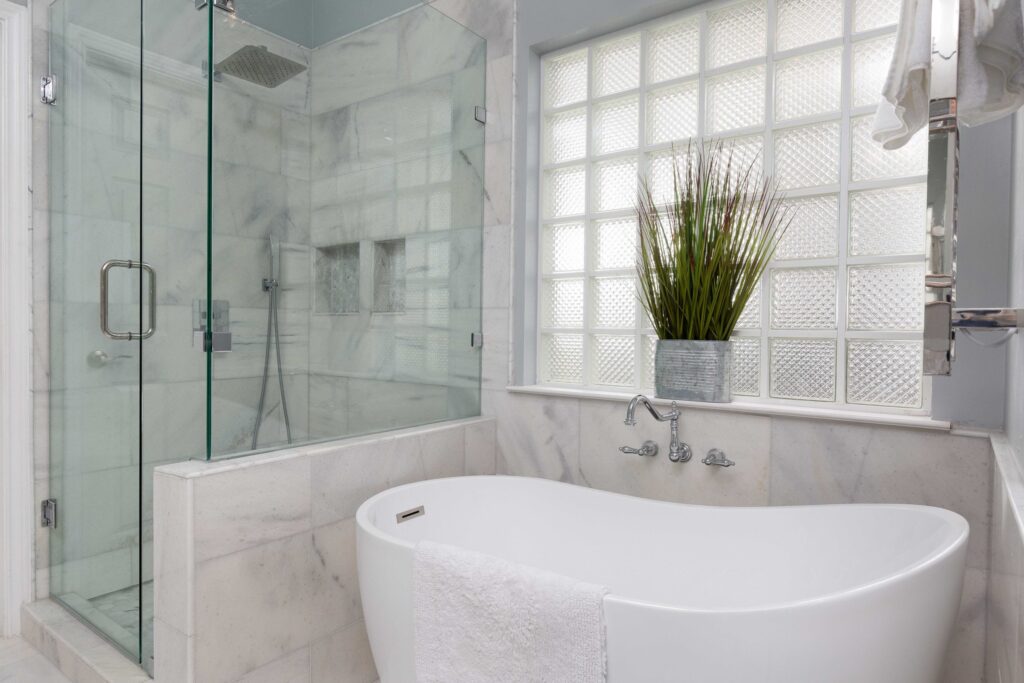 Master bathroom remodel with glass shower and soaking tub in Austin TX